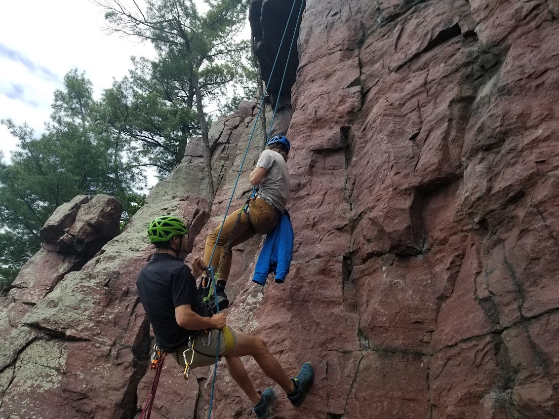 Guide spotting and coaching movement on Devils Lake rock